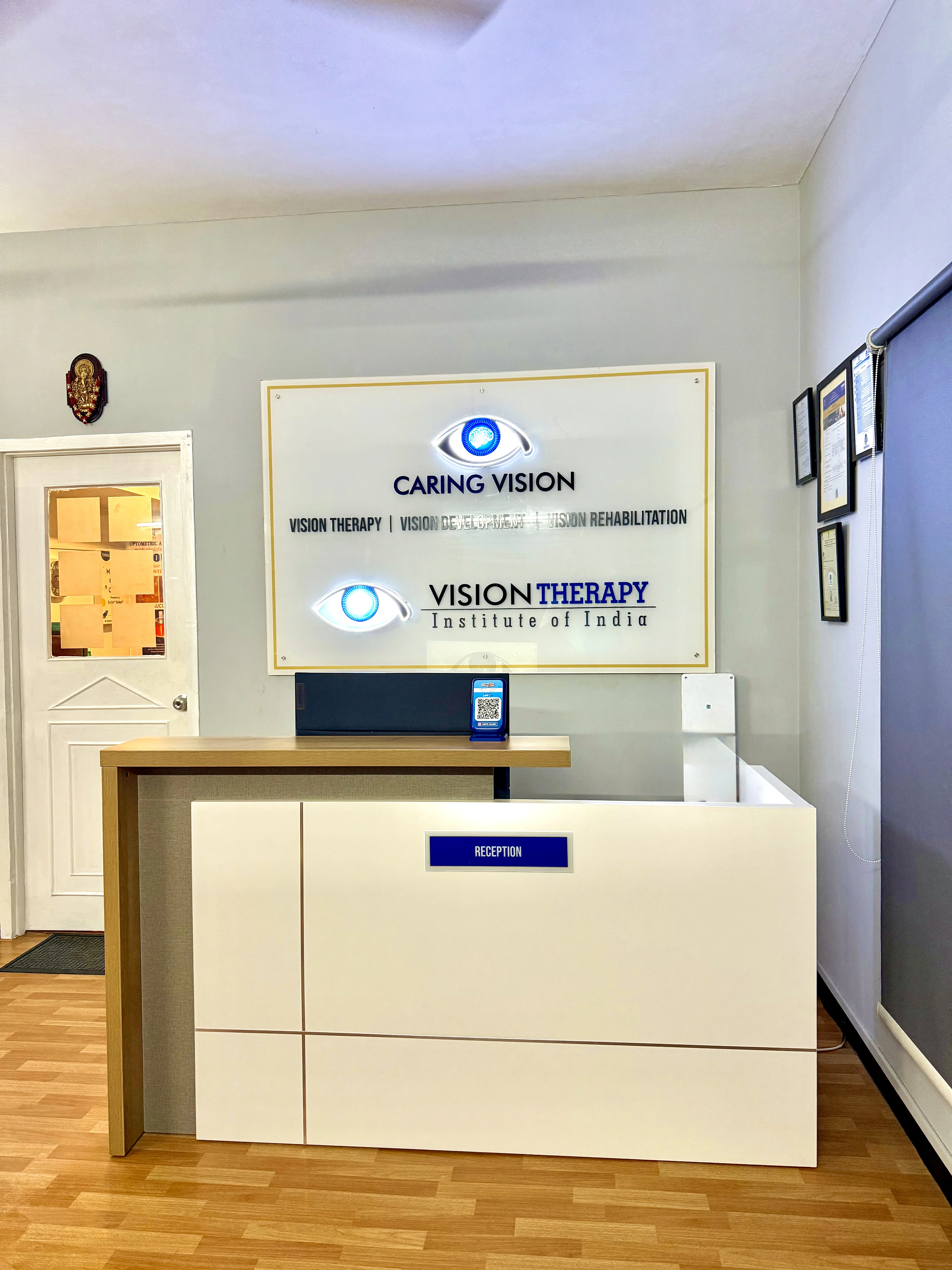 Reception desk at Caring Vision Therapy, Ashok Nagar