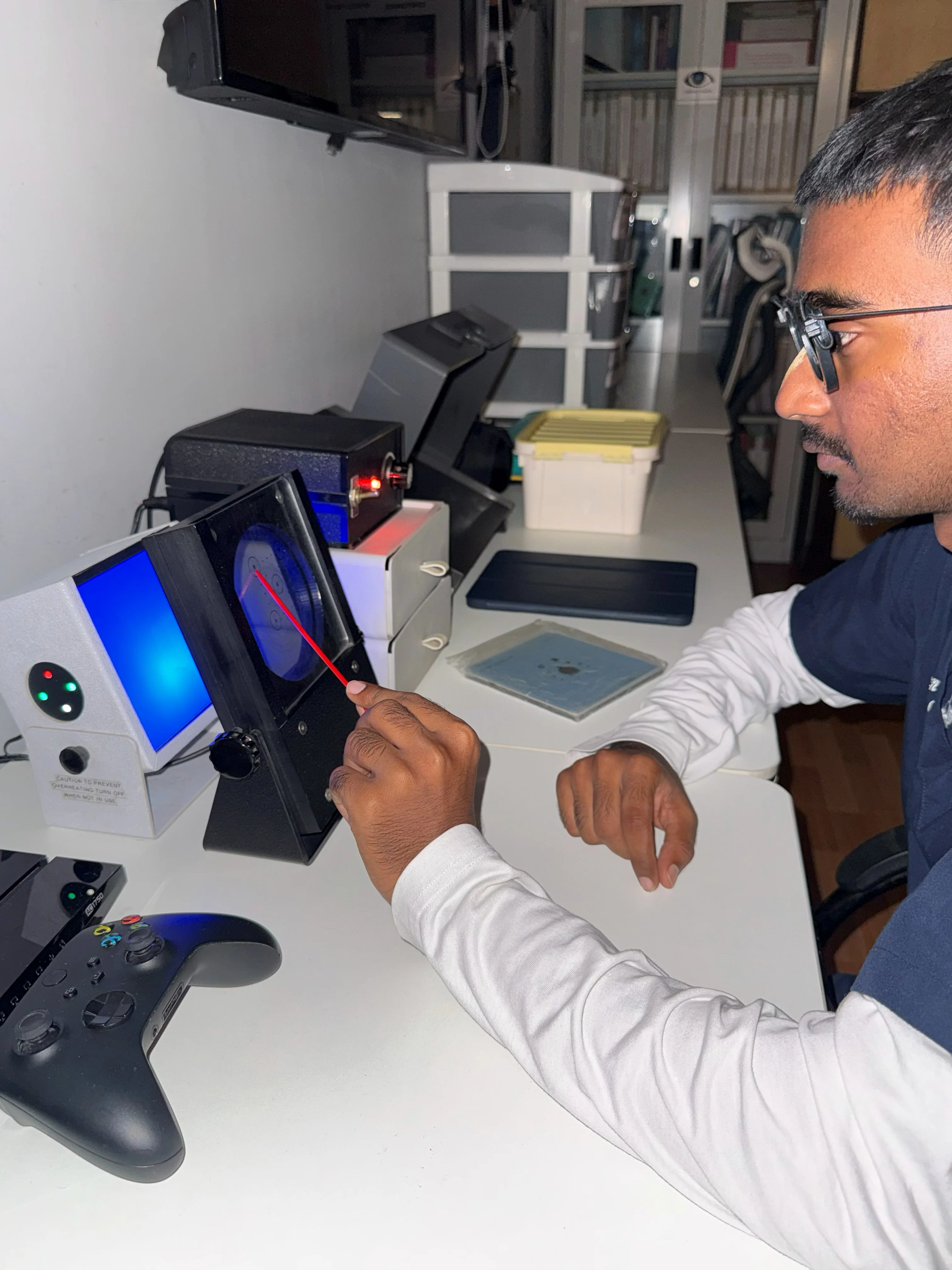 Anaglyph glasses tablet exercise session at Caring Vision Therapy clinic