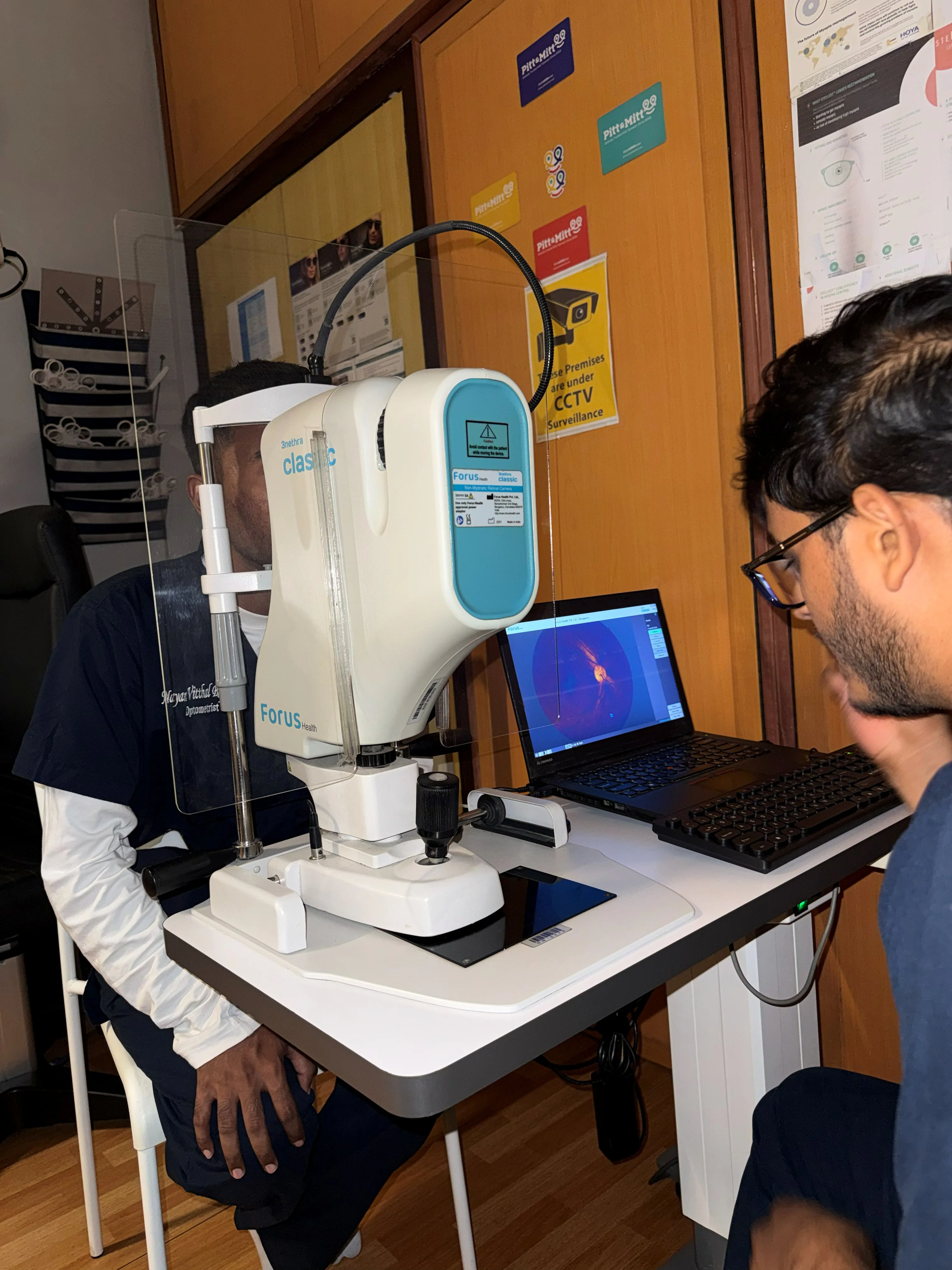 Auto-refractor examination session at Caring Vision Therapy clinic