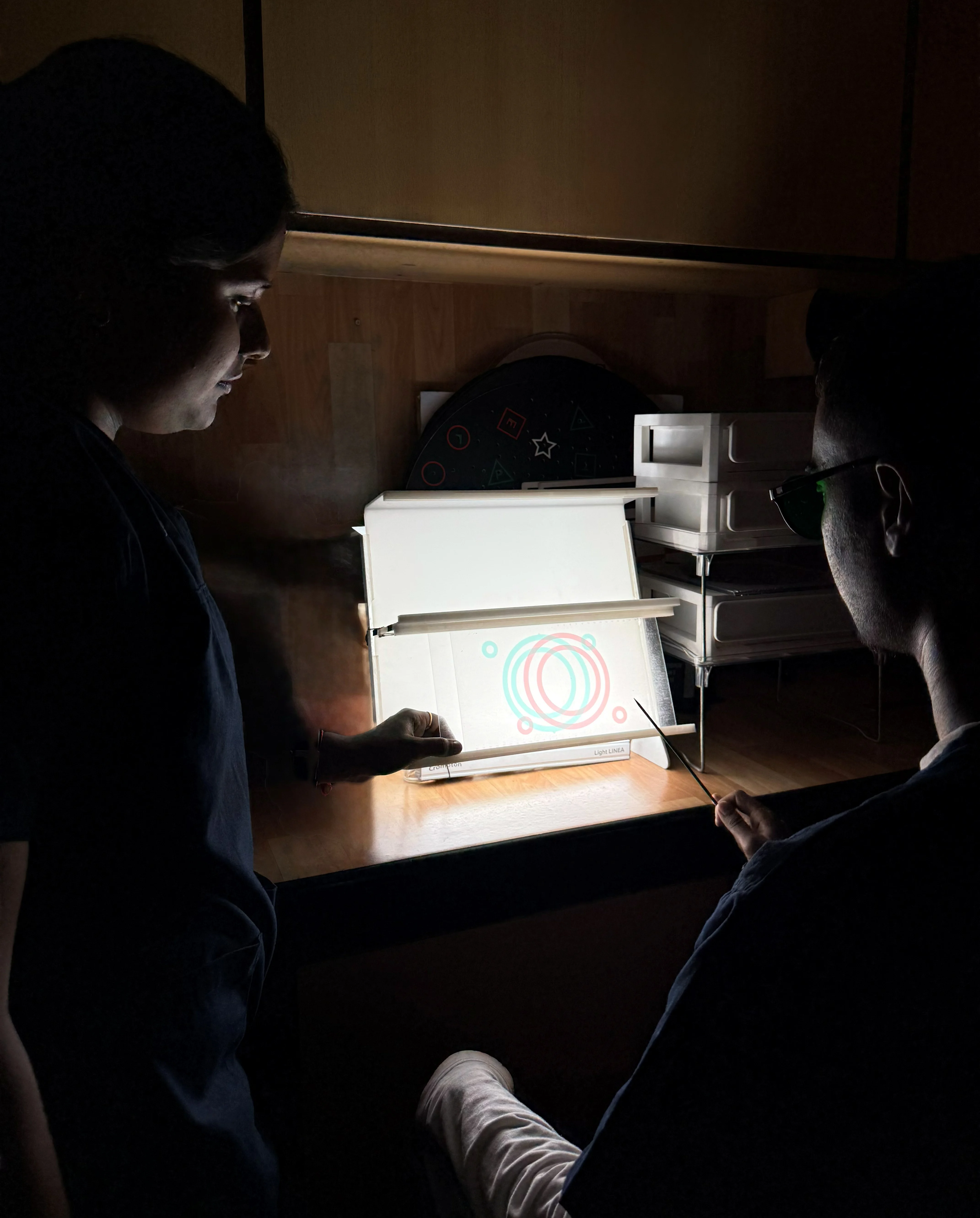 Illuminated fusion target exercise at Caring Vision Therapy, Ashok Nagar