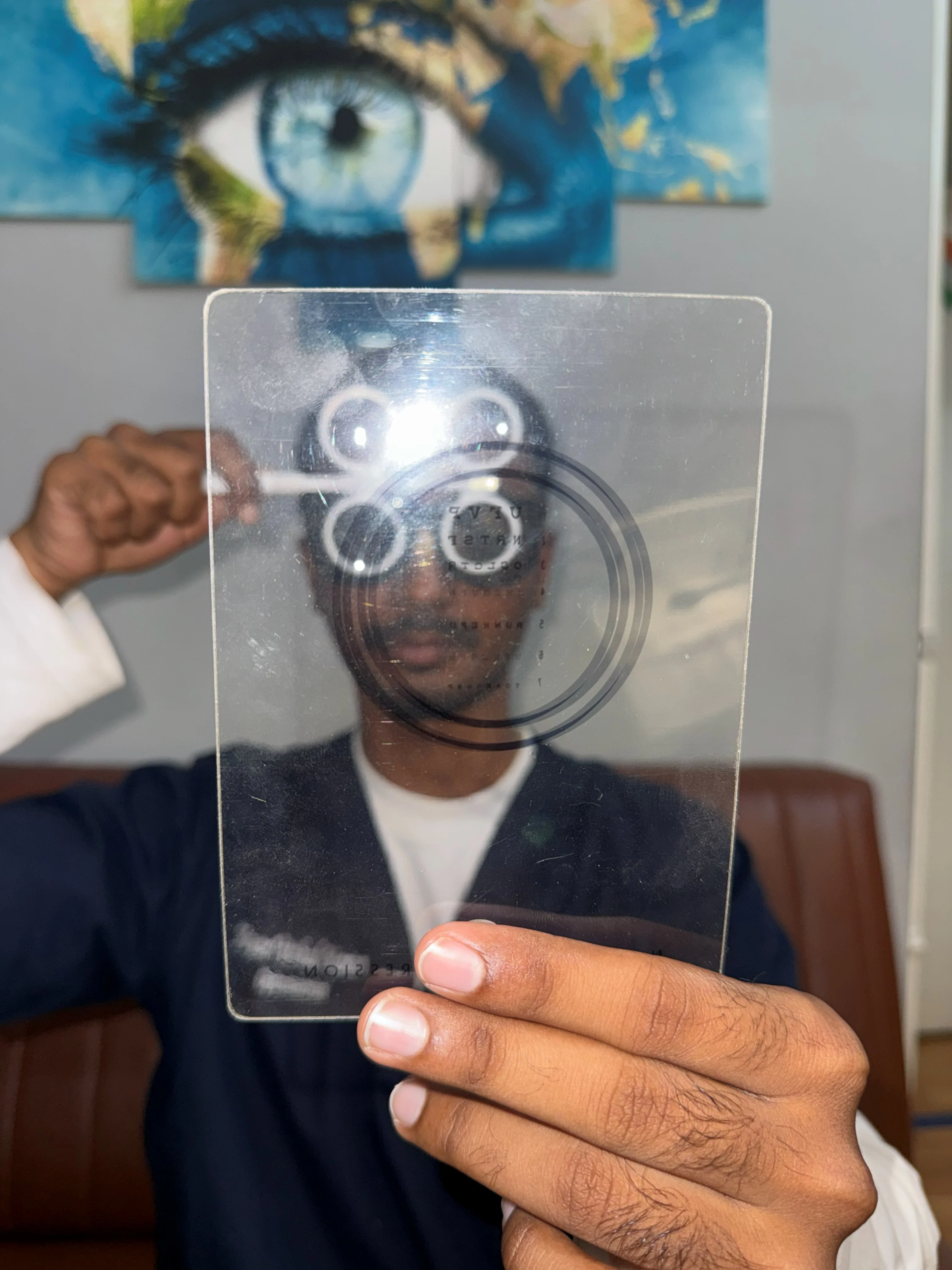 Lens flipper exercise during vision therapy session at Caring Vision Therapy
