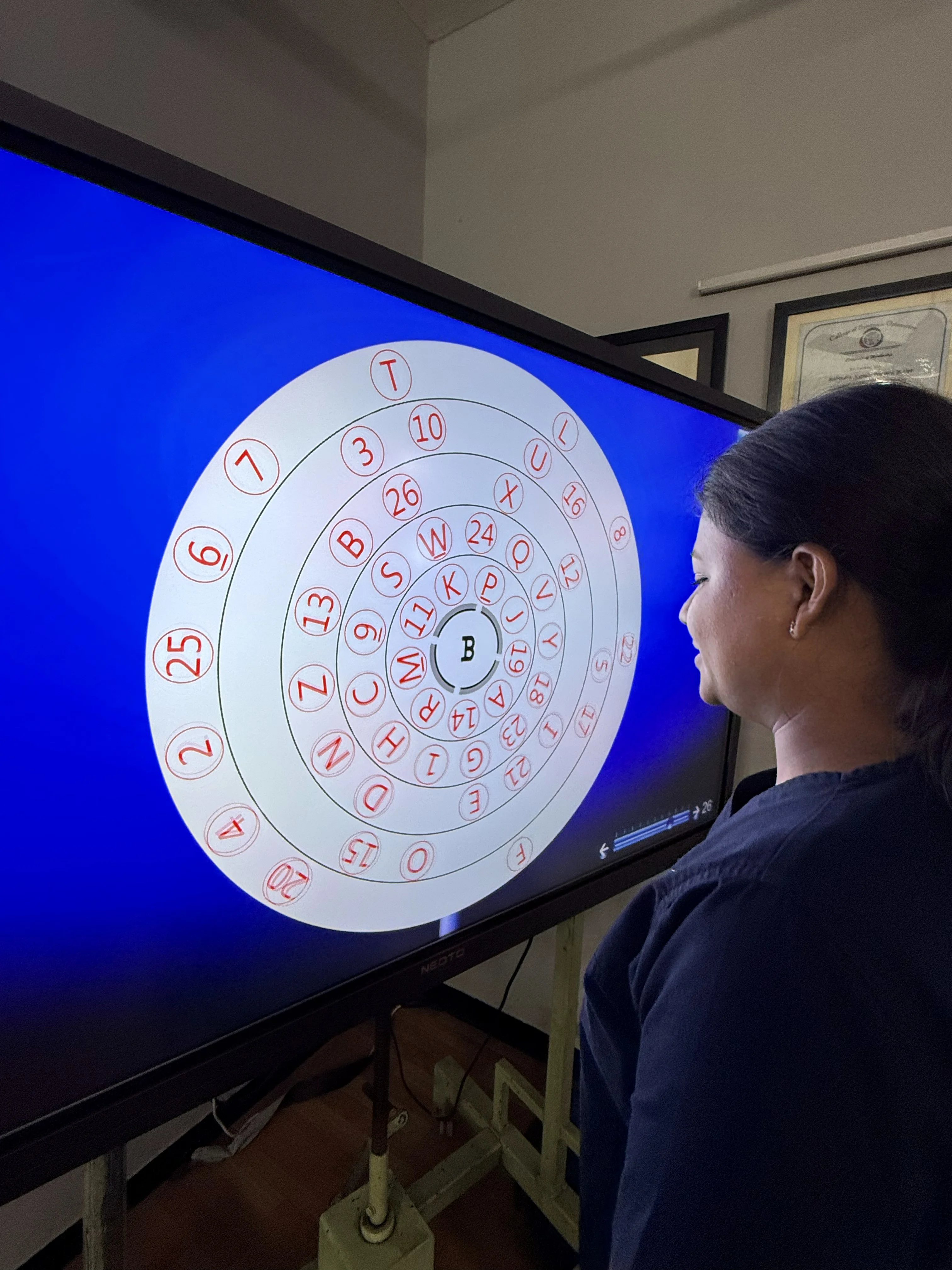 Visual tracking screen exercise at Caring Vision Therapy clinic