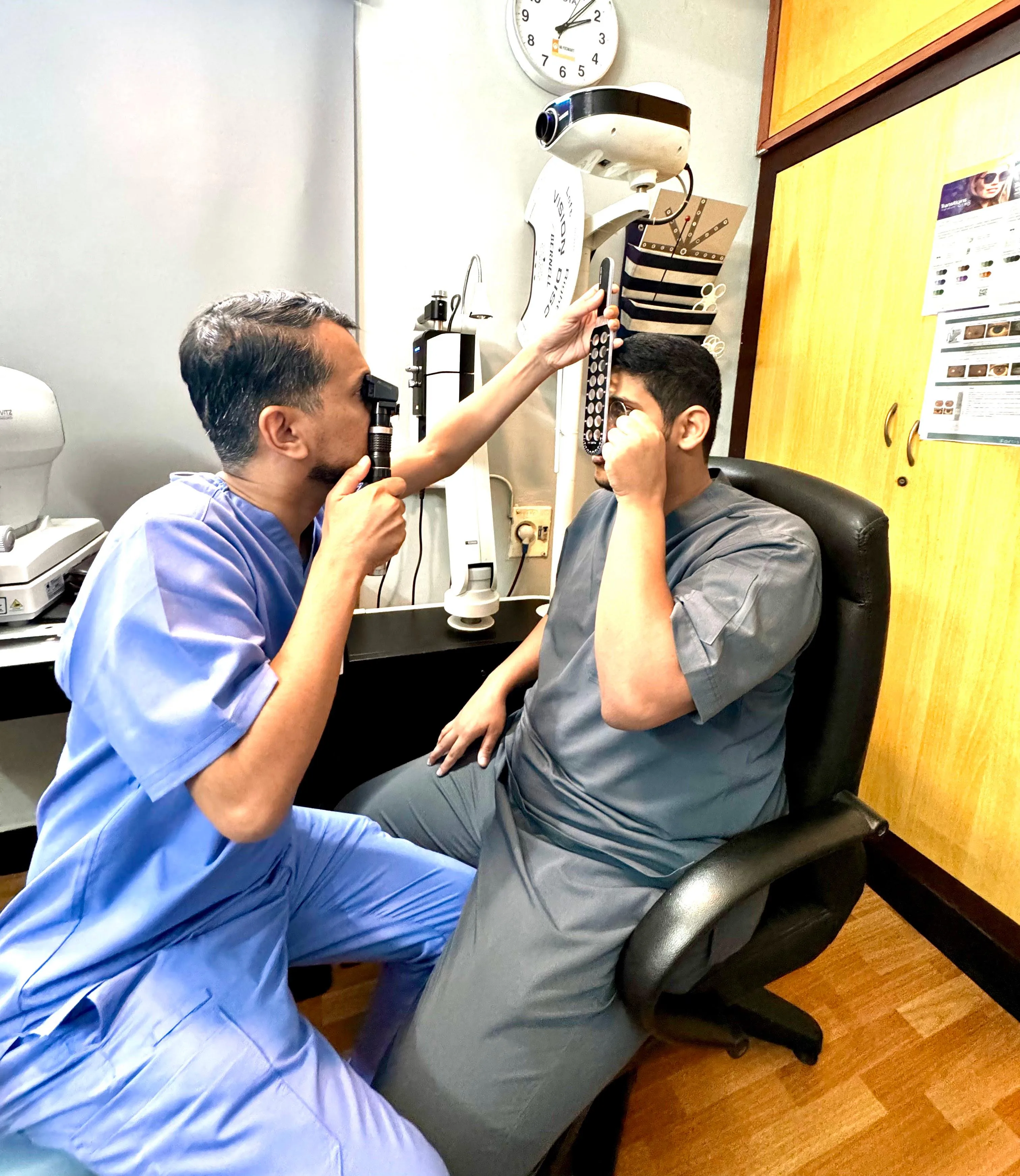 Trainee performing practical eye examination during hands-on training at Vision Therapy Institute